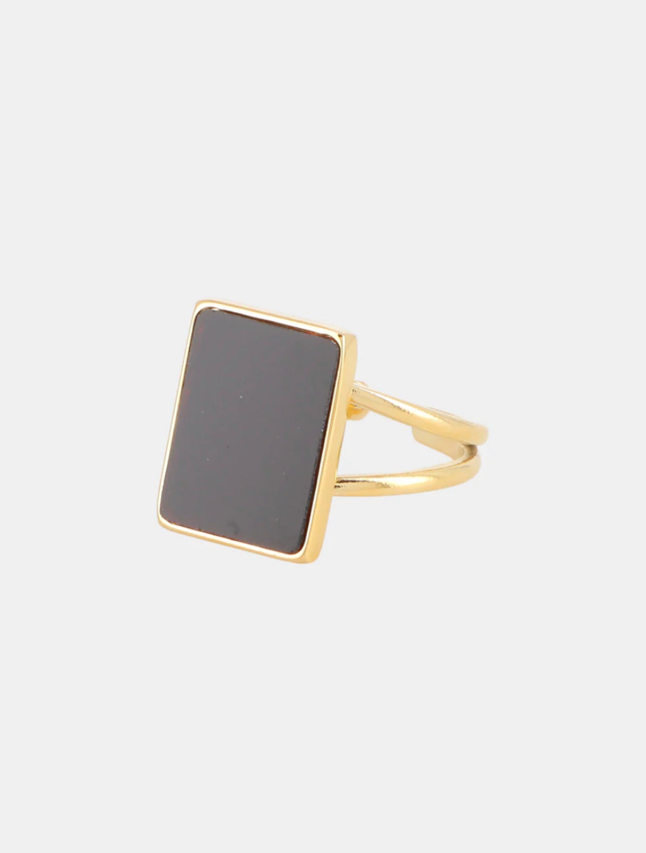 Onyxia, bague dorée à pierre noire vue de face – OZ’anges