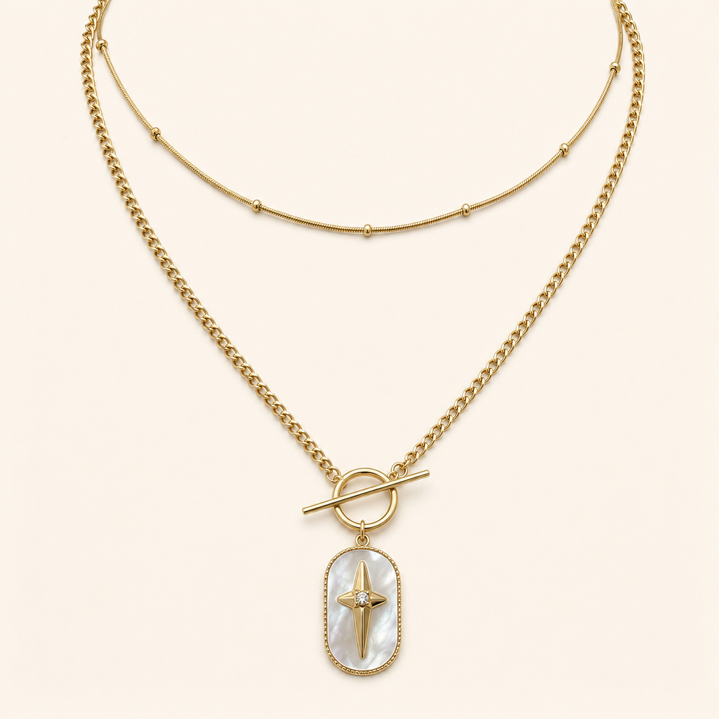 Nouriya, collier double rang doré à pendentif nacré étoilé sur fond ivoire – OZ’anges