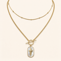 Nouriya, collier double rang doré à pendentif nacré étoilé sur fond ivoire – OZ’anges