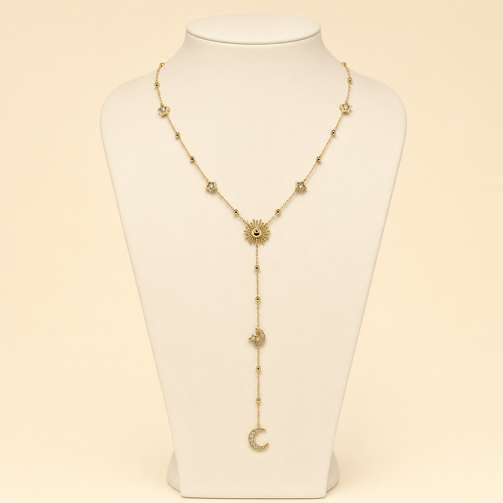 Collier Solévia en Y sur buste ivoire, motifs célestes dorés