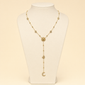 Collier Solévia en Y sur buste ivoire, motifs célestes dorés