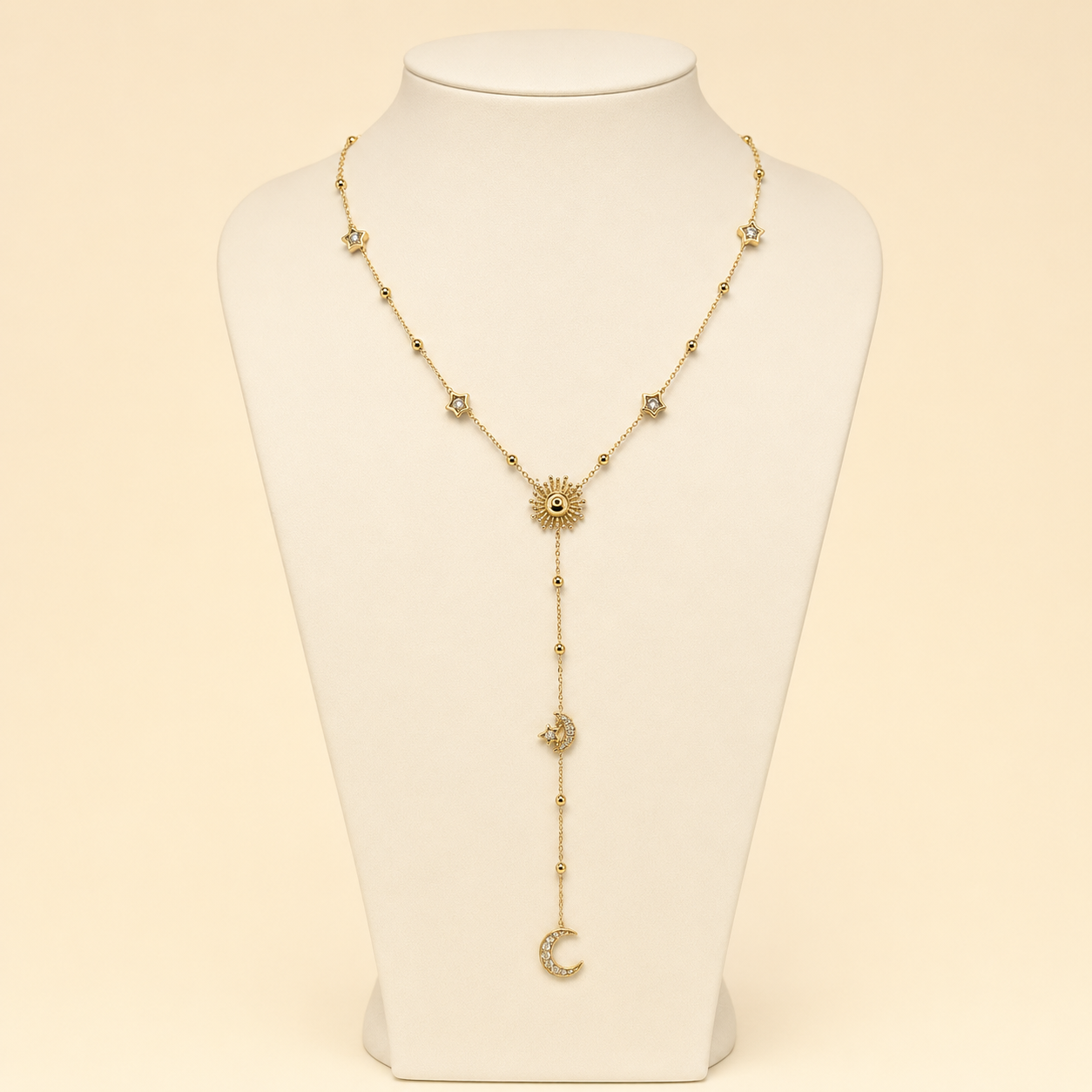 Collier Solévia en Y sur buste ivoire, motifs célestes dorés